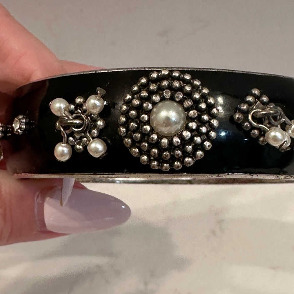 Jessica Simpson Black and Silver Bracelet with Intricate Detailing